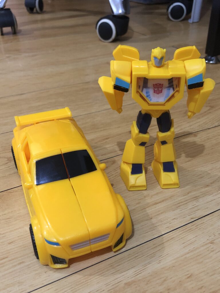 yellow bumblebee robot and car