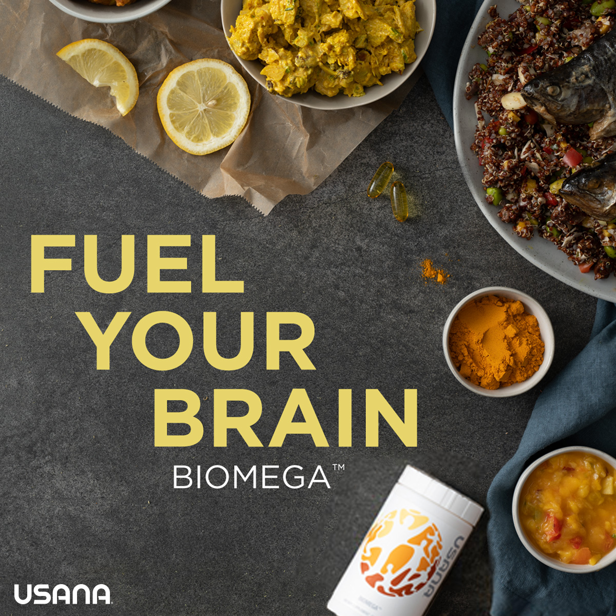 usana biomega bottle fuel your brain fish in a bown and turmeric powder with sliced lemon