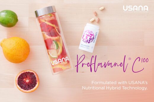 lemon orange sliced orange and a bottle of usana proflavanol c